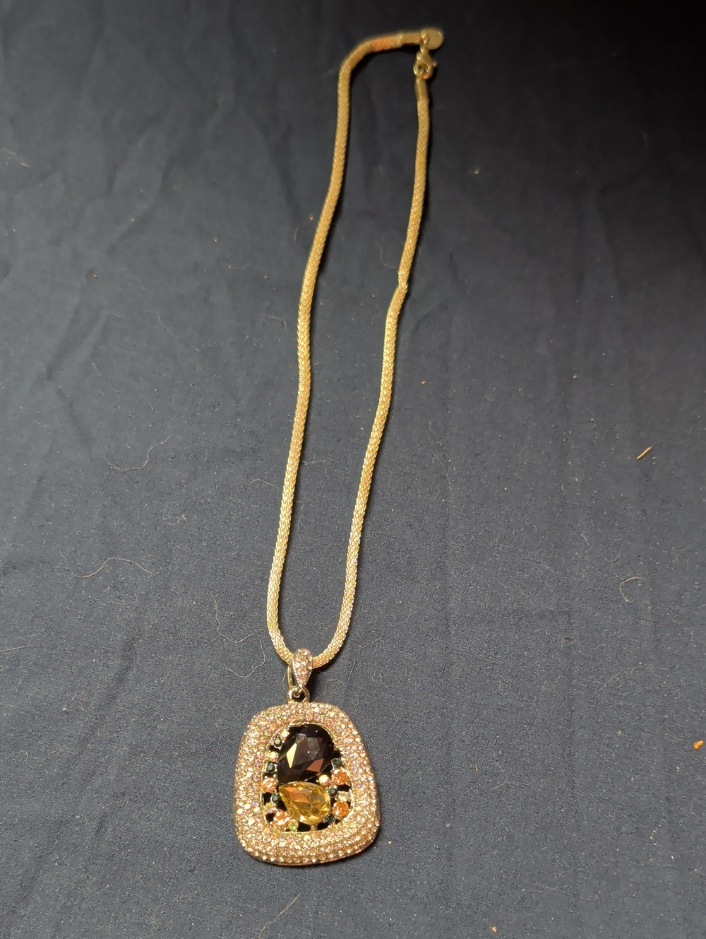 Silver-Tone Pendant Necklace with Black and Amber Stones